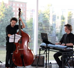 Student musicians entertain summer institute attendees during the welcome reception.