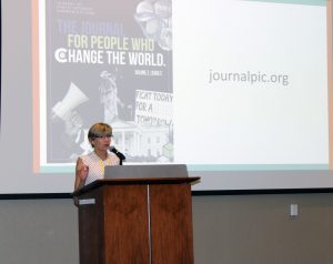 Angela Bradbery, Karel chair in public interest communications at the University of Florida, offers remarks at the closing session.