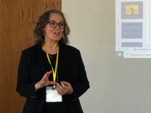 Facilitator Jennifer Reich speaks at a session about the intersection of social sciences and public interest communications.