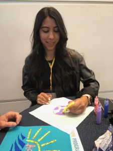 Attendee Juliana Cardona creates a quilt square.